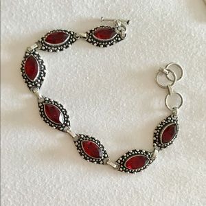 Available March 925 Sterling & Garnet bracelet